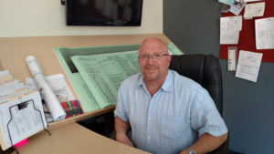 ABA president Mike Epstein at desk - 3