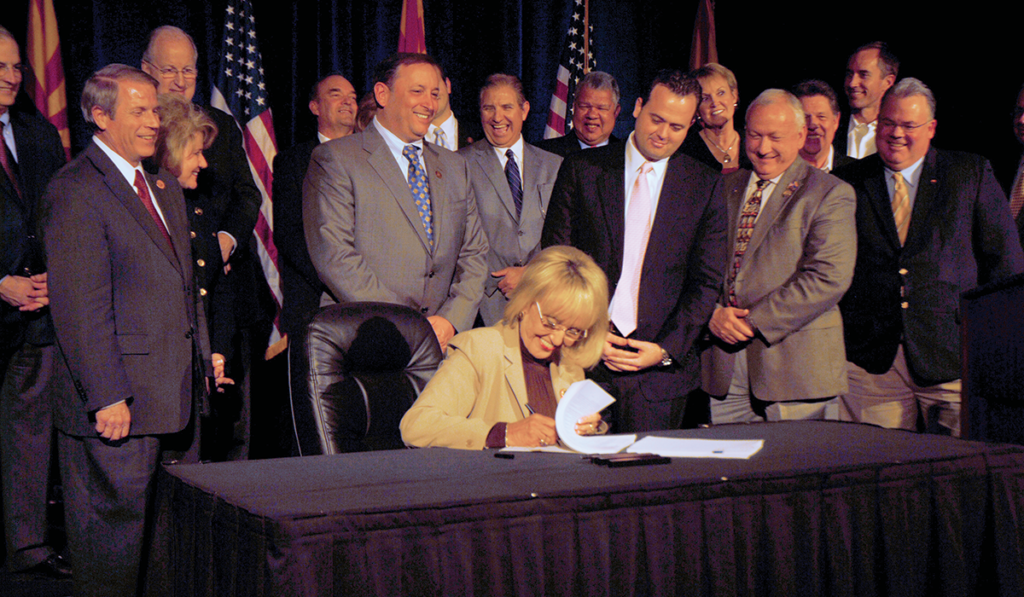  Governor Jan Brewer signs HB 2001 on February 17, 2011, legislation establishing the Arizona Commerce Authority and implementing key economic development initiatives