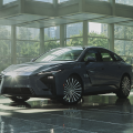 2027 Lexus ES 350h parked in a glass-walled showroom