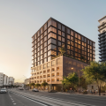 Street-level view of a modern residential building planned for Roosevelt Row