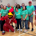 Avnet and Arizona Cardinals volunteers with mascot Big Red and cheerleaders at a Boys & Girls Clubs STEM event